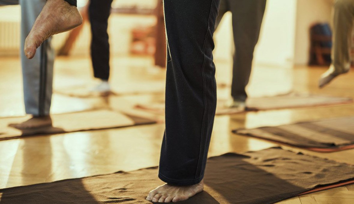 Elderly person exercising in group